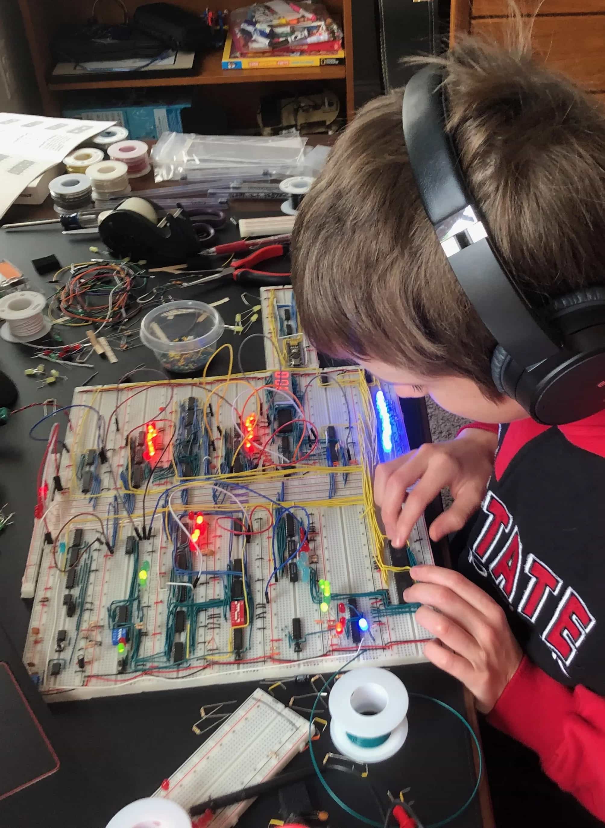 Image of Nicholas assembling his 8-bit breadboard computer