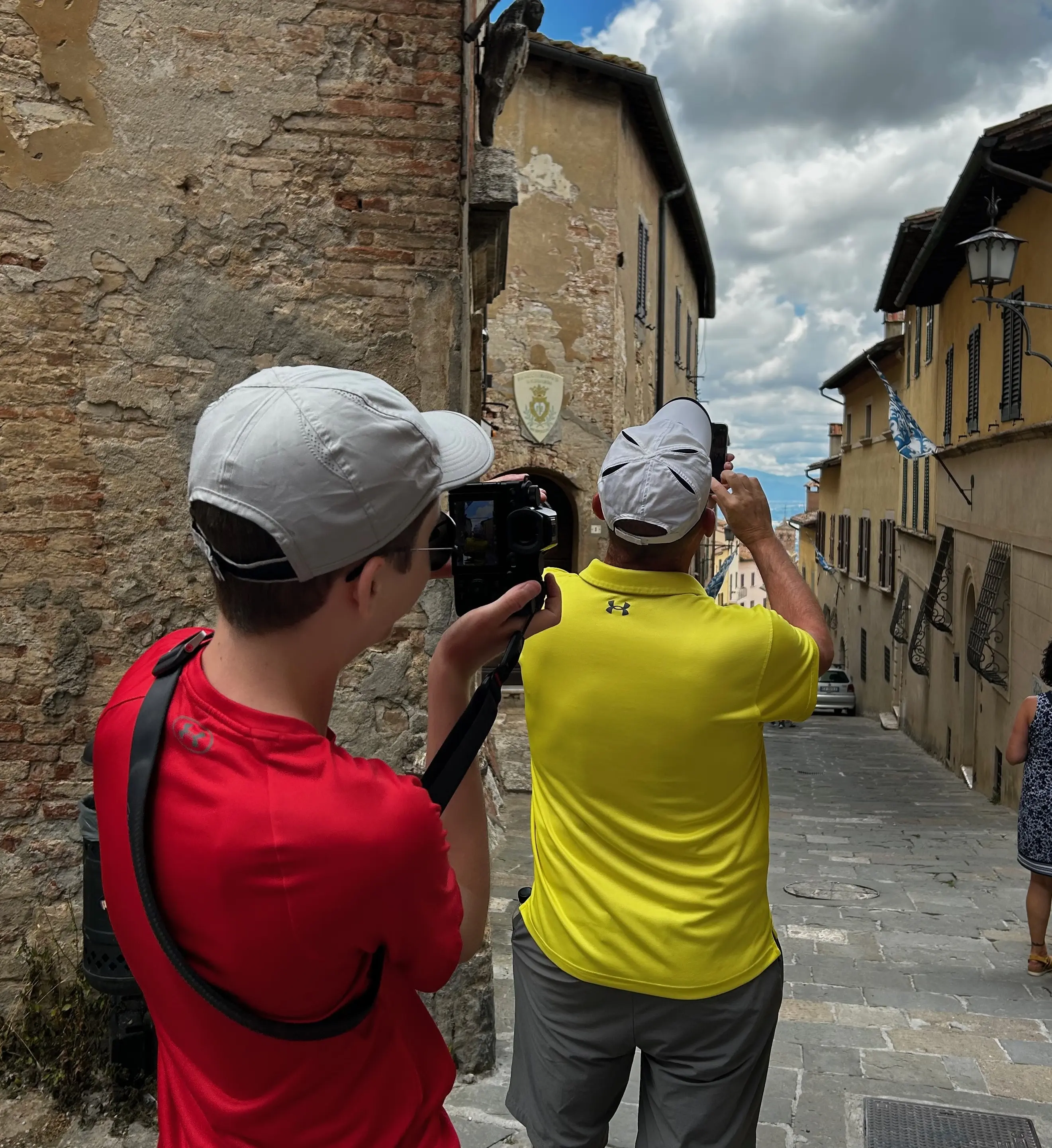A photo of Nicholas taking a photo of another person taking a photo